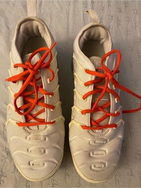 Nike men’s or women’s not sure  Nike shoes  in Cream with Bright Orange